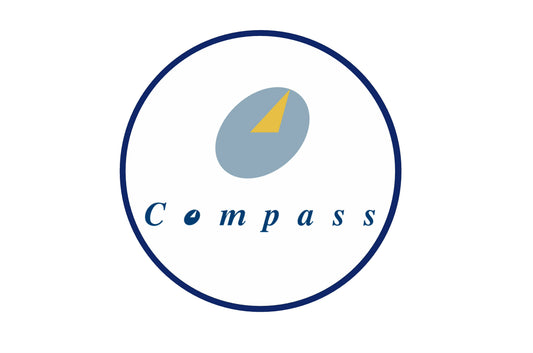 Compass Airlines round logo sticker.